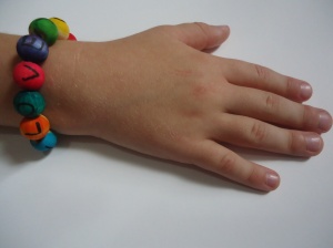 hand with bead bracelet